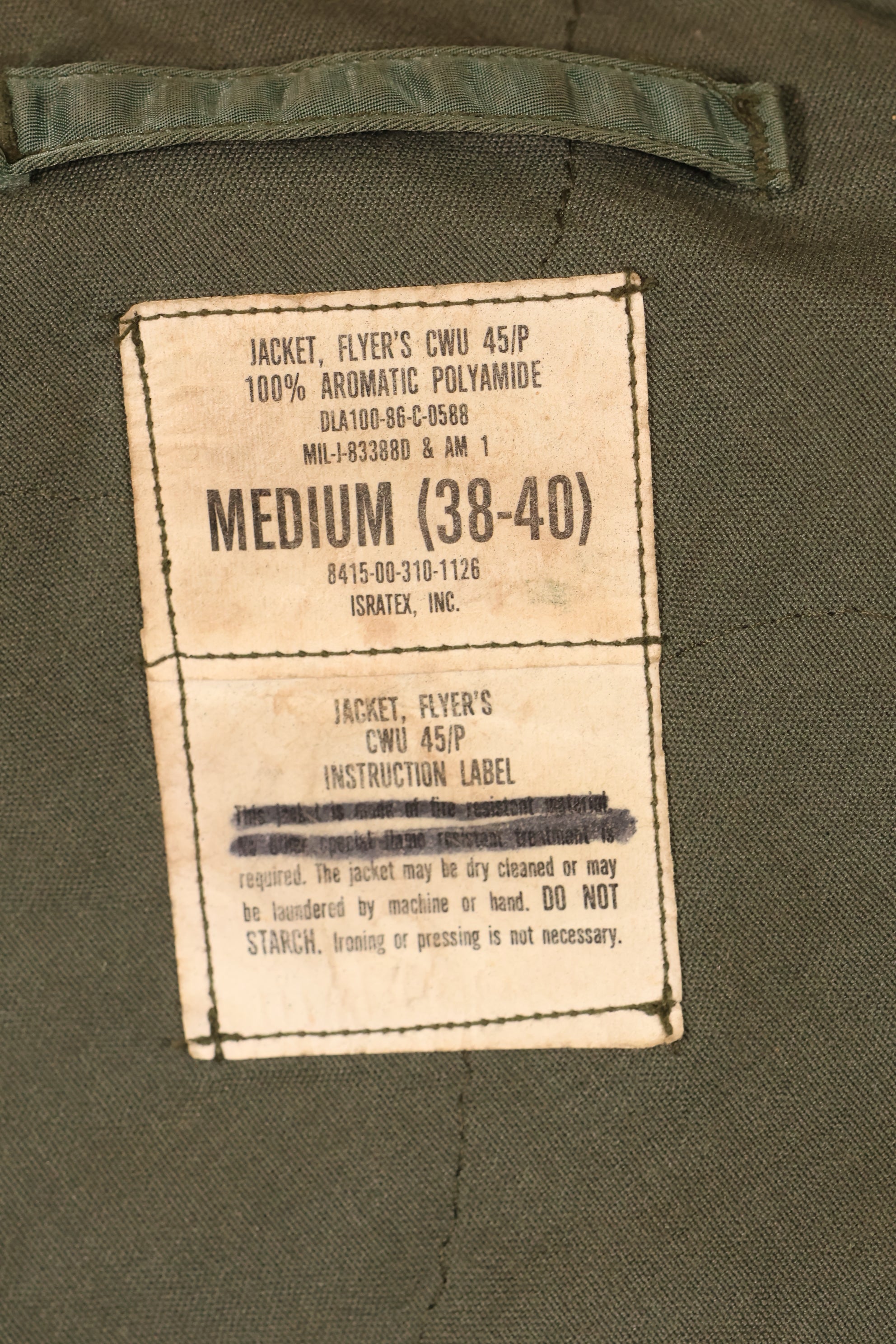 1986年契約　MEDIUM　アメリカ海軍　CWU-45P　インターメディエイトゾーン　フライトジャケット　中古品